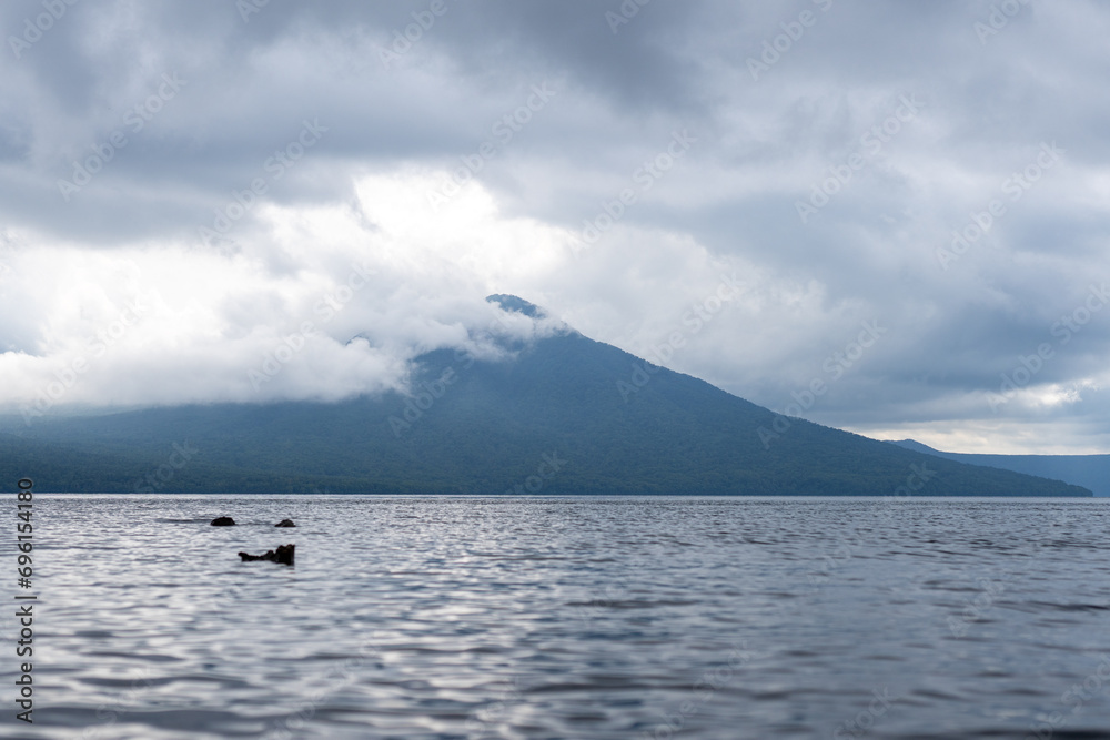 mount eniwa across lake shikotsu in a national park in hokkaido japan mount eniwa across lake shikotsu in a national park in hokkaido japan