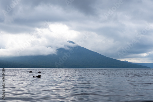 mount eniwa across lake shikotsu in a national park in hokkaido japan photo
