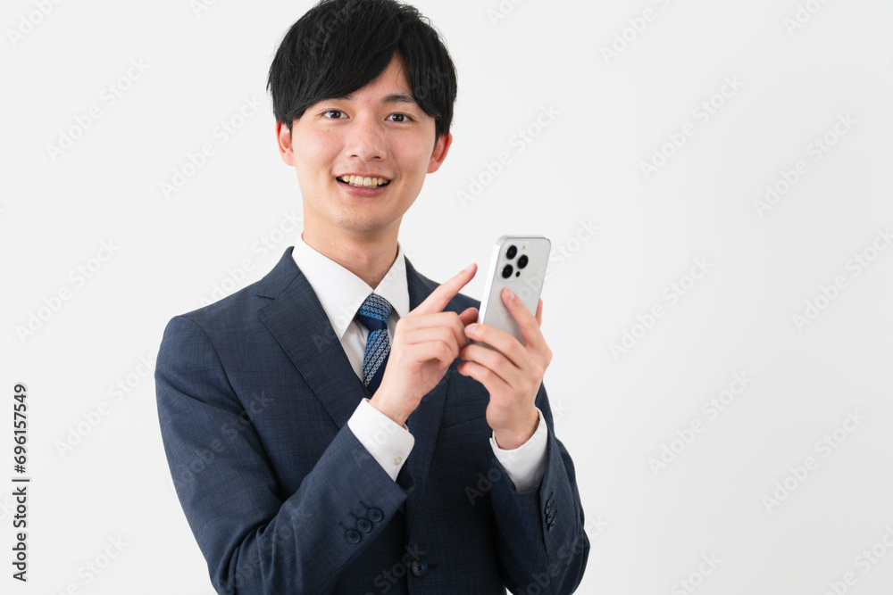 ビジネススーツを着ている若い男性　ビジネスイメージ