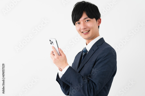 ビジネススーツを着ている若い男性　ビジネスイメージ © aijiro