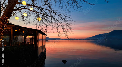 ioannina by the lake pamvotis in winter season sunset in greece