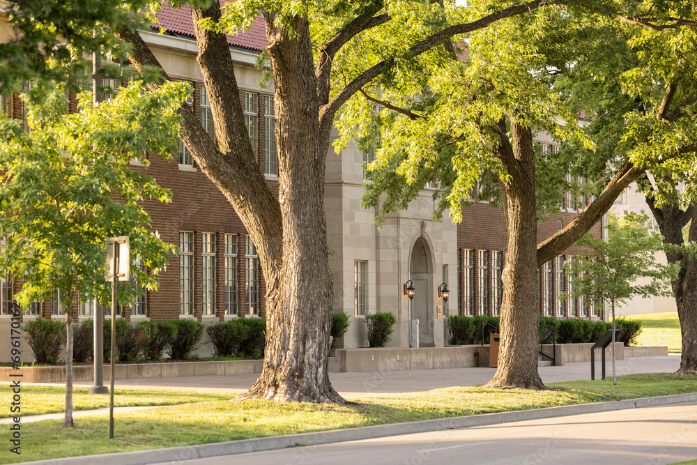 Topeka, Kansas, USA - June 17, 2023: Afternoon sun shines on the school ...
