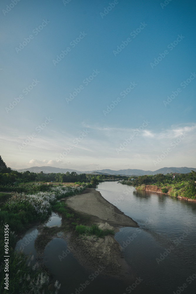 River in the middle of the mountains at sunset River in the middle of the mountains at sunset