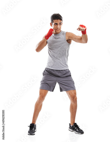 Boxer, man and kickboxing in studio with sports for fitness, health and martial arts isolated on white background. Strong athlete with muscle, action and fighting with MMA training and exercise