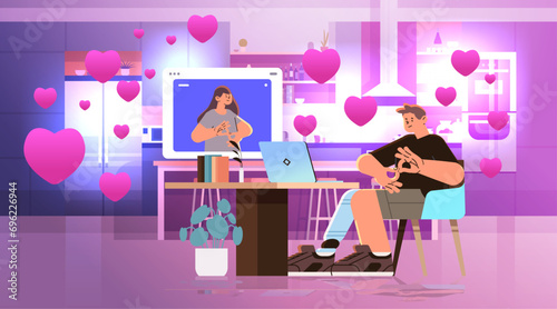 people with hearing aid disabled deaf mute couple in love communicate during video call using sign language valentines day celebration