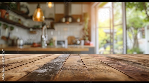 Warm Sunlight Bathing a Modern Kitchen Interior with Rustic Wooden Tabletop photo