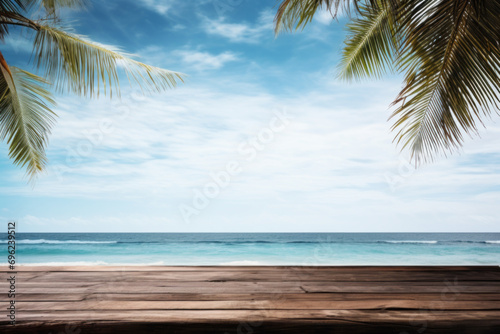 Empty wide Table top wooden bar with blurred beautiful beach scene background coconut leaf on the frame for product display mockup outside summer day time, Resort on nature sea © Natalia Klenova