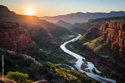 Canyon farewell river journey in fading sunset glow, beautiful sunrise image