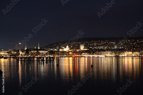 Lake Zurich at night. Old town city light reflected on the water surface  no people