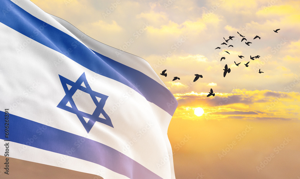 Waving flag of Israel against the background of a sunset or sunrise. Israel flag for Independence Day. The symbol of the state on wavy fabric. - obrazy, fototapety, plakaty 