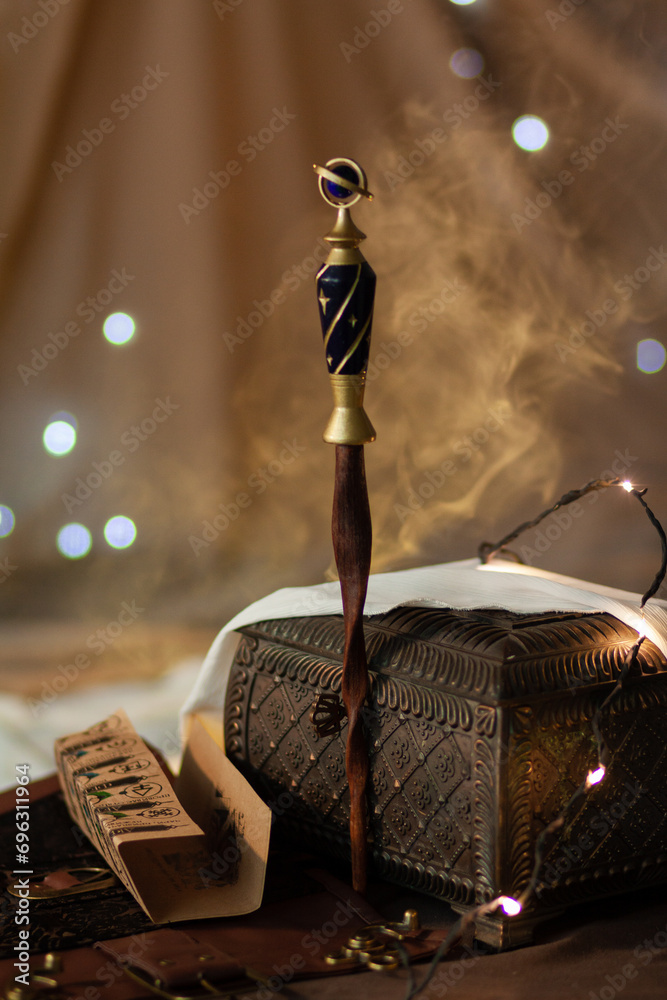 Fototapeta premium A magic wand among the sorcerer's magical artifact