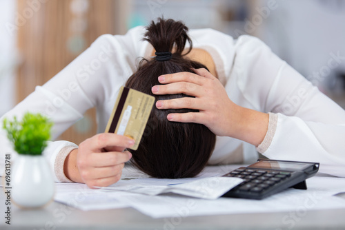 sad young woman having problems about her debts photo