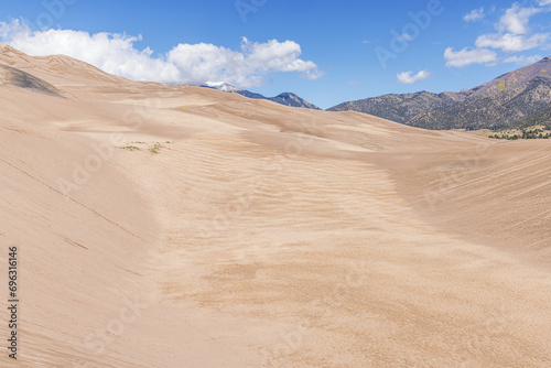 High sand dunes and the Rocky Mountains in the Great Sand Dunes National Park