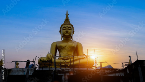 Buddha statue at sunset in evening time.