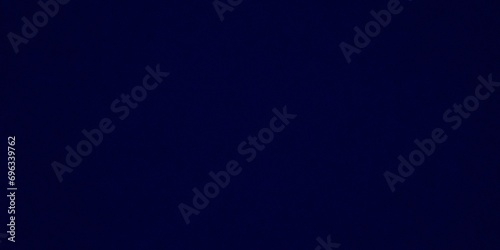 background with rays, soft and blurred dark blue grainy textured gradient background, copy space