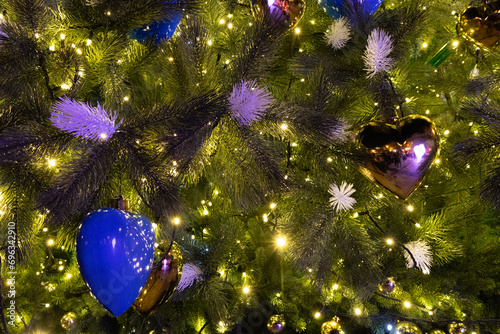 Kyiv, Ukraine - December 20, 2023: a Christmas tree was installed in the center of Kyiv on Sofiyivska Square. The garlands glow beautifully in the evening. Christmas tree 2023-2024. photo