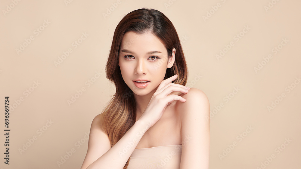 Beautiful young asian woman with clean fresh skin on beige background, Face care, Facial treatment, Cosmetology, beauty and spa, Asian women portrait. Beautiful young asian woman with clean fresh skin on beige background, Face care, Facial treatment, Cosmetology, beauty and spa, Asian women portrait.