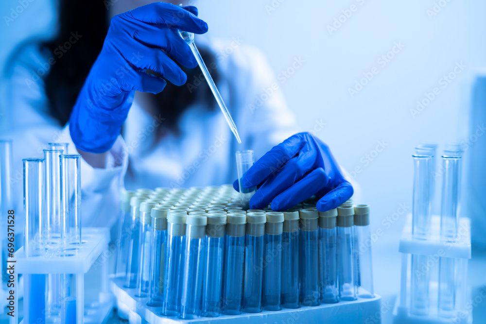 pure water test, drop liquid sample from pipette to the test tube in the laboratory pure water test, drop liquid sample from pipette to the test tube in the laboratory