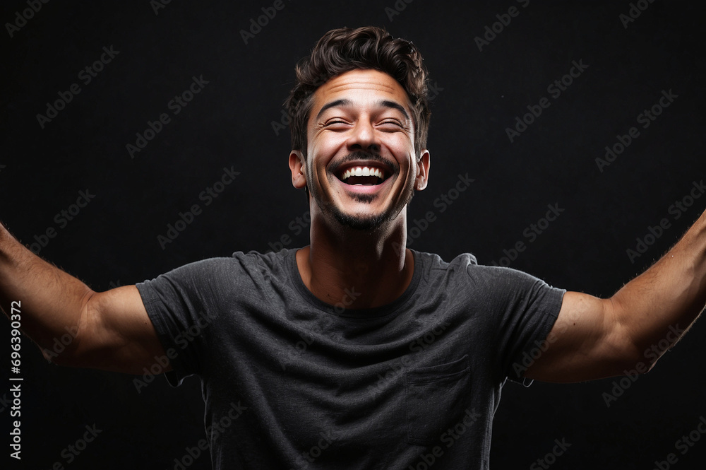a man is feeling very cheerful isolated on black background