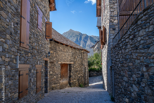 small street in taull with romanesque stone constructions in the boi valley in lleida catalonia spain photo