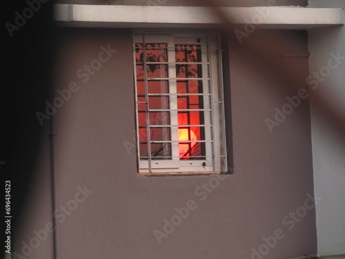 Sun reflection in Glass Window in House Sun set in mirror