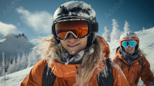 Happy snowboarders having fun on top of snow mountain