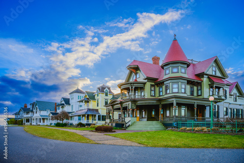 Oak Bluffs skyline at sunrise with landmark houses and dramatic winter cloudscape over the Ocean Park on Martha's Vineyard, Massachusetts, Unites States photo