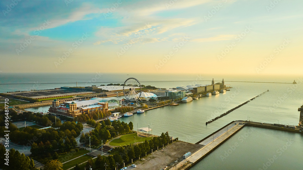 Navy Pier on Lake Michigan at sunrise with aerial of Ferris Wheel at dawn, Chicago, IL - obrazy, fototapety, plakaty 