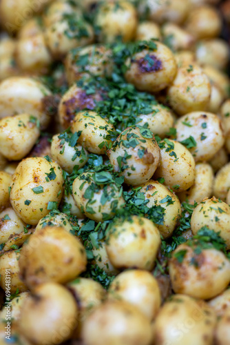 Roasted baby potato with vegetables and parsley