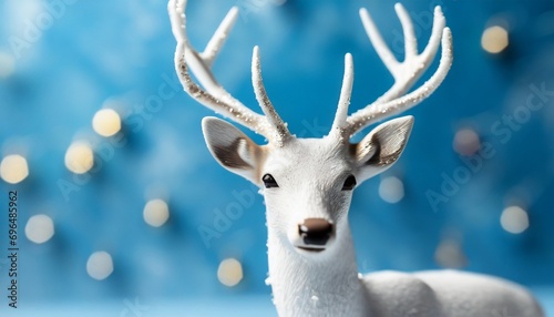 White deer on a blue background. New year concept.  