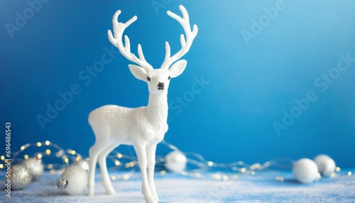 White deer on a blue background. New year concept