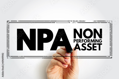 NPA Non Performing Asset - bank loan that is subject to late repayment or is unlikely to be repaid by the borrower in full, acronym text concept stamp photo