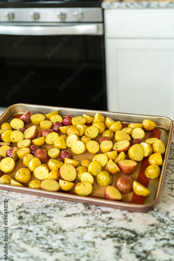 Roasting Halved Mixed Marble Potatoes in Modern Kitchen