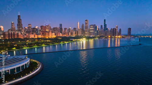 Chicago coast aerial with city lights reflected at night on Lake Michigan water near Shedd Aquarium © Nicholas J. Klein