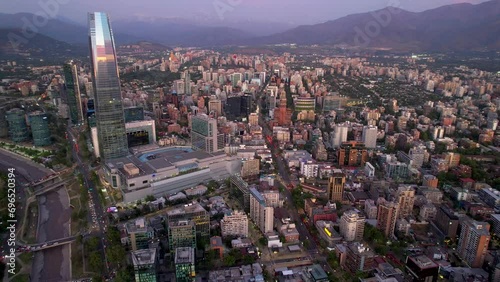 Beautiful aerial footage of the city of Santiago de Chile, the Mapocho River, the Costanera Center and the mall photo