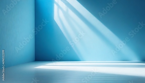 minimal abstract light blue background for product presentation incident light from window on wall and floor