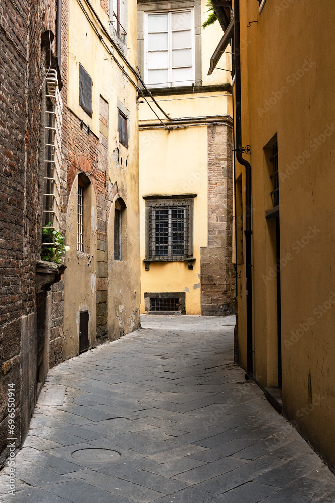the old street of the old town of Lucca with the medieval architecture. Tuscany