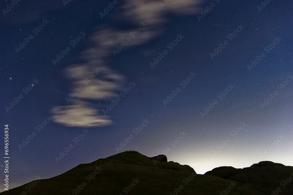 Northumberland night sky over Northumberlandia with stars, cloud and light pollution. Northumberland night sky over Northumberlandia with stars, cloud and light pollution.