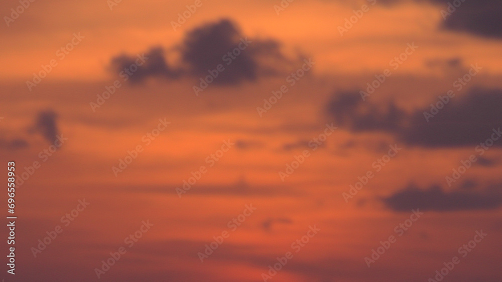 Cloudy sunset with orange sky