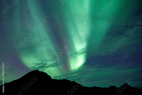 Northern lights and silhouette foreground © Richard