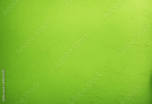 Bright lime green concrete wall texture. Close-up shot of rough painted surface. Provides a vibrant background with room for creative design. Spacious and empty. photo