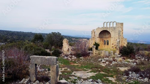 Drone captures Okuzlu ruins, revealing history and ancient ruins.Okuzlu, a journey through history, ancient ruins visible. Ancient ruins of Okuzlu, historical exploration from above photo