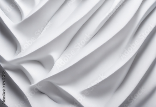 Textured white foam kink shape on a plain background photo