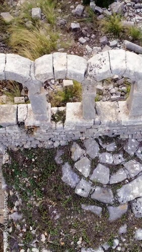 Drone captures Okuzlu's basilica showcasing ancient culture and history Aerial view of Okuzlu reveals rich cultural heritage in its basilica ruins Okuzlu's basilica ruins testament to ancient culture photo