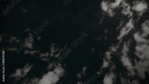 Fototapeta Naklejka Na Ścianę i Meble -  dark night sky with clouds and stars, space as background