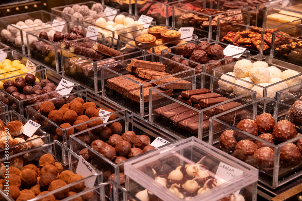 Diverse Sweet Delights: Assorted Treats in Labeled Bowls