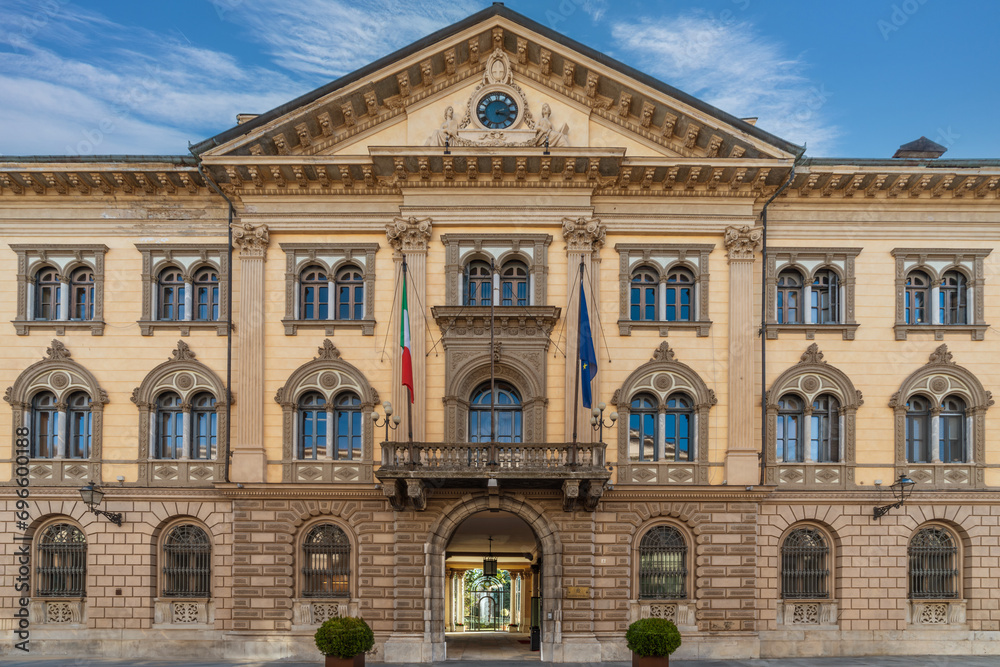 Cuneo, Piedmont, Italy - December 19, 2023: The facade of building Prefecture Cuneo (1882) in street Rome, majestic neoclassical building