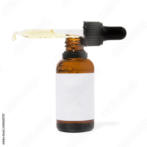 Amber glass dropper bottle with oil dripping on white background with blank label