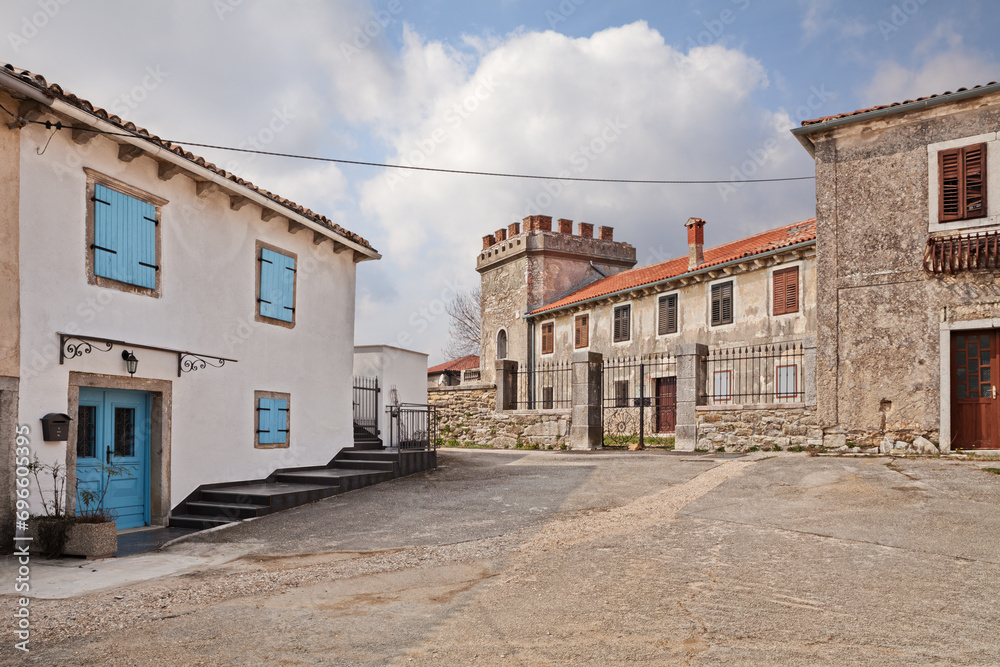 Lindar, Pazin, Istria, Croatia: the village square with an ancient palace with tower