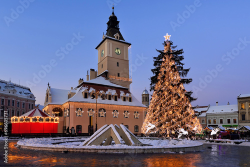 Brasov Council square at dusk. Christmas tree lights